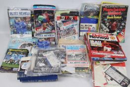 A collection of football programmes, various clubs including West Bromwich Albion, Manchester City,
