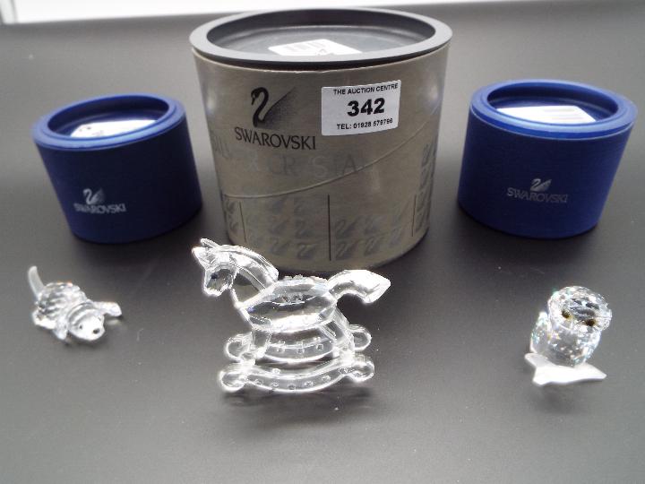 Swarovski Crystal - three figures comprising a Rocking Horse, an Owl and a Puppy,