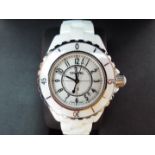 Chanel J12 - a lady's white ceramic quartz wristwatch,