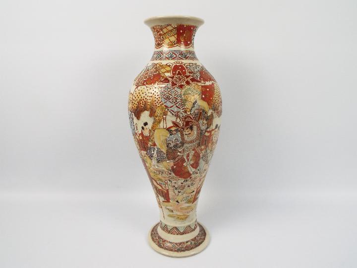 A large vase decorated with samurai, app