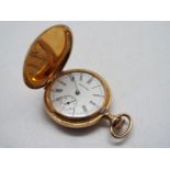 A lady's 14k gold cased Hunter pocket wa