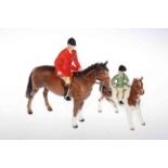 Beswick huntsman with red jacket and a girl on pony (2).