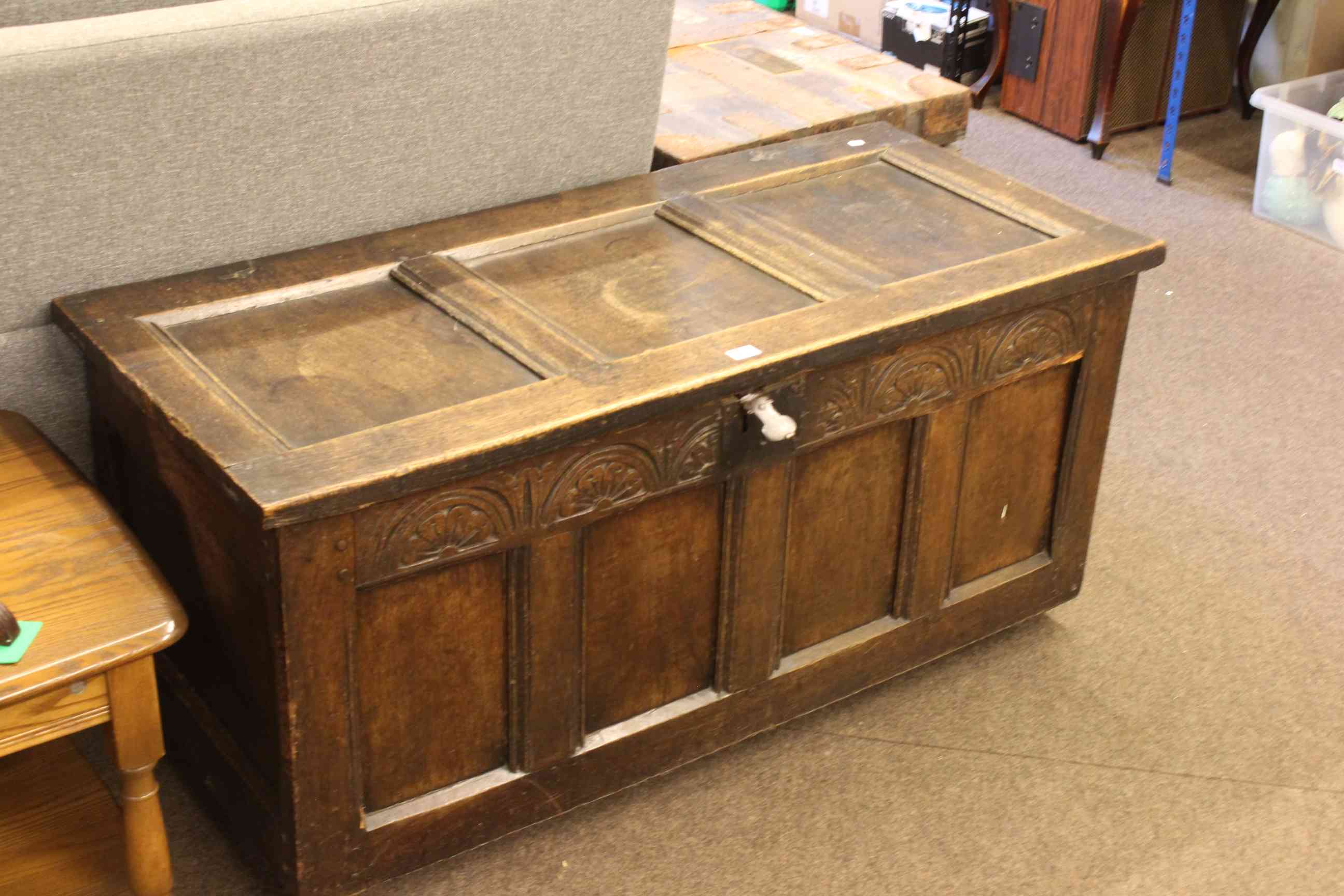 Antique jointed oak four panel front coffer, 54 x 118 x 51cm.