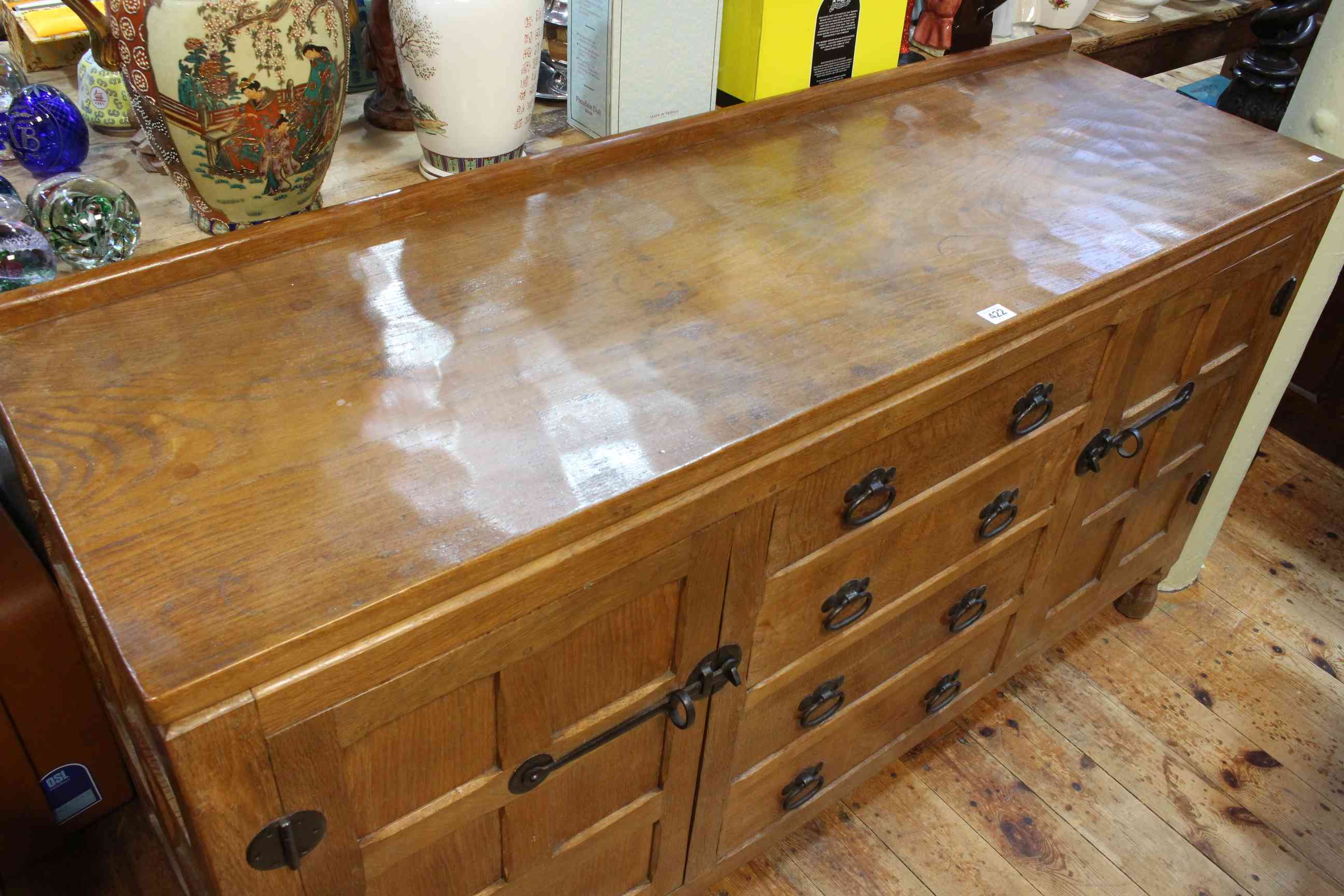 In the manner of Robert Thompson jointed oak and adzed cut sideboard having four central drawers - Image 2 of 2