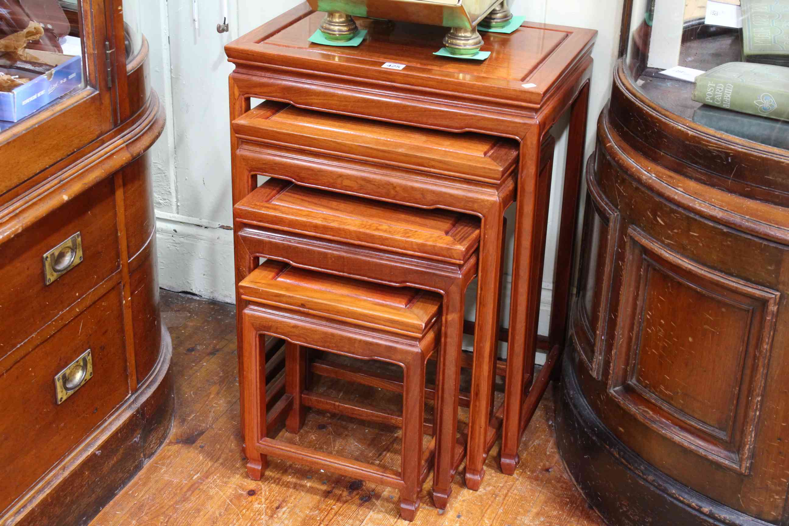 Quartetto nest of Oriental hardwood tables (largest 66 x 51 x 35.5cm).