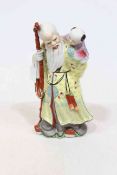 Chinese figure of elder with child, 31cm.