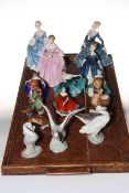 Eight Royal Doulton figures including four by Peggy Davies, two Hummel figures,