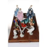 Eight Royal Doulton figures including four by Peggy Davies, two Hummel figures,