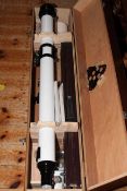 Cased telescope, tripod and accessories.