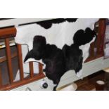 Cow hide rug.