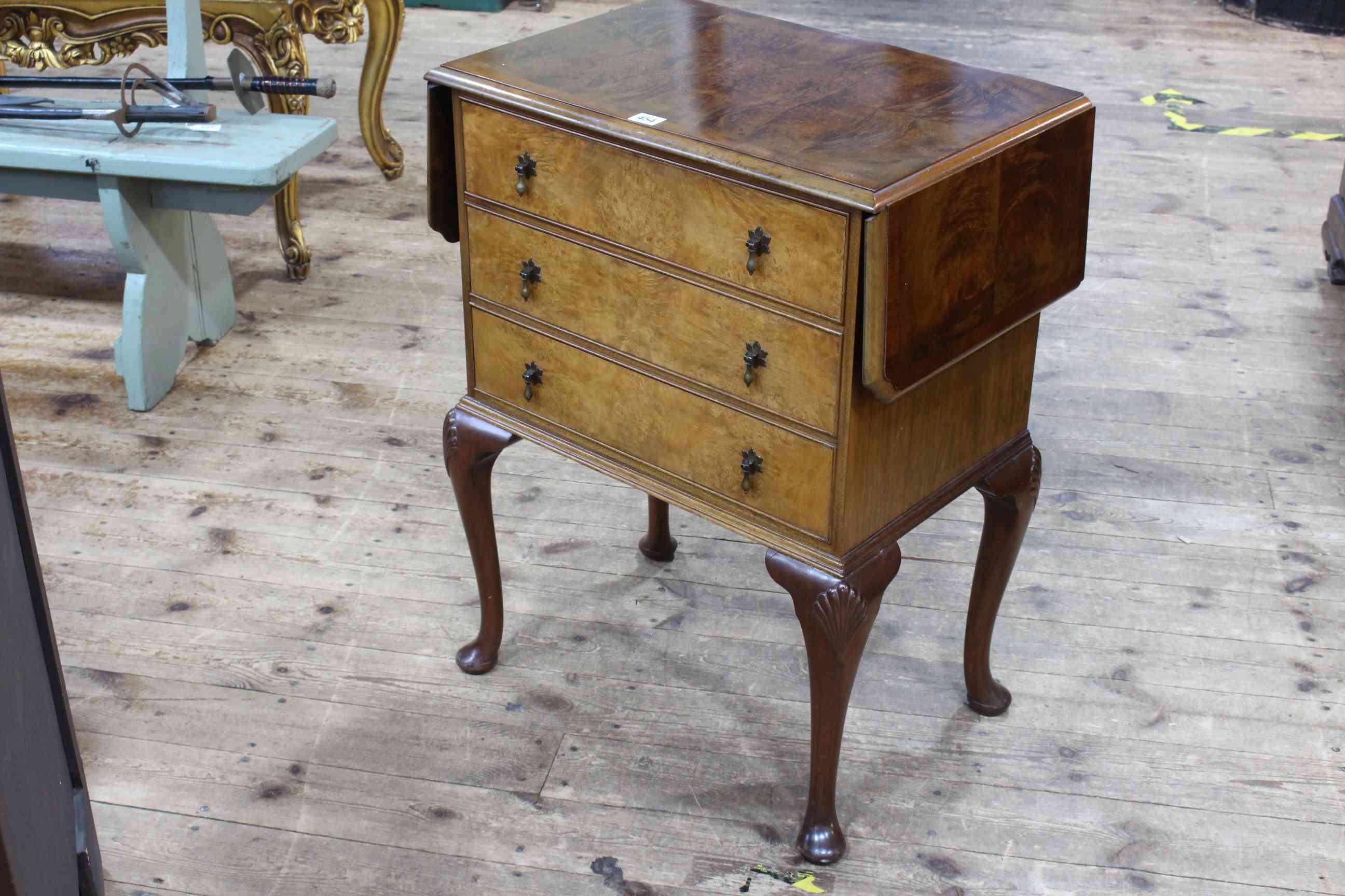 Walnut three drawer drop side chest on cabriole legs, 75cm by 58cm by 38cm (leaves down).