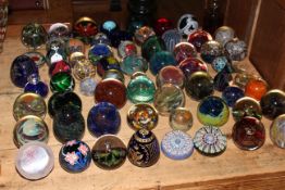 Large collection of various glass paperweights including Caithness, Mdina, etc.