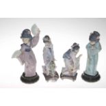 Four Lladro Japanese girl figures.
