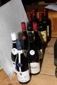 Nine bottles of red wine, four Lussac Saint-Emilion, two Réserve de Bonpas and three others.