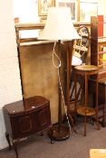 Mahogany bow front sewing cabinet and contents, standard lamp and shade,