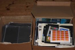 Two boxes of FDCs, stamps, presentation sleeves, booklets,