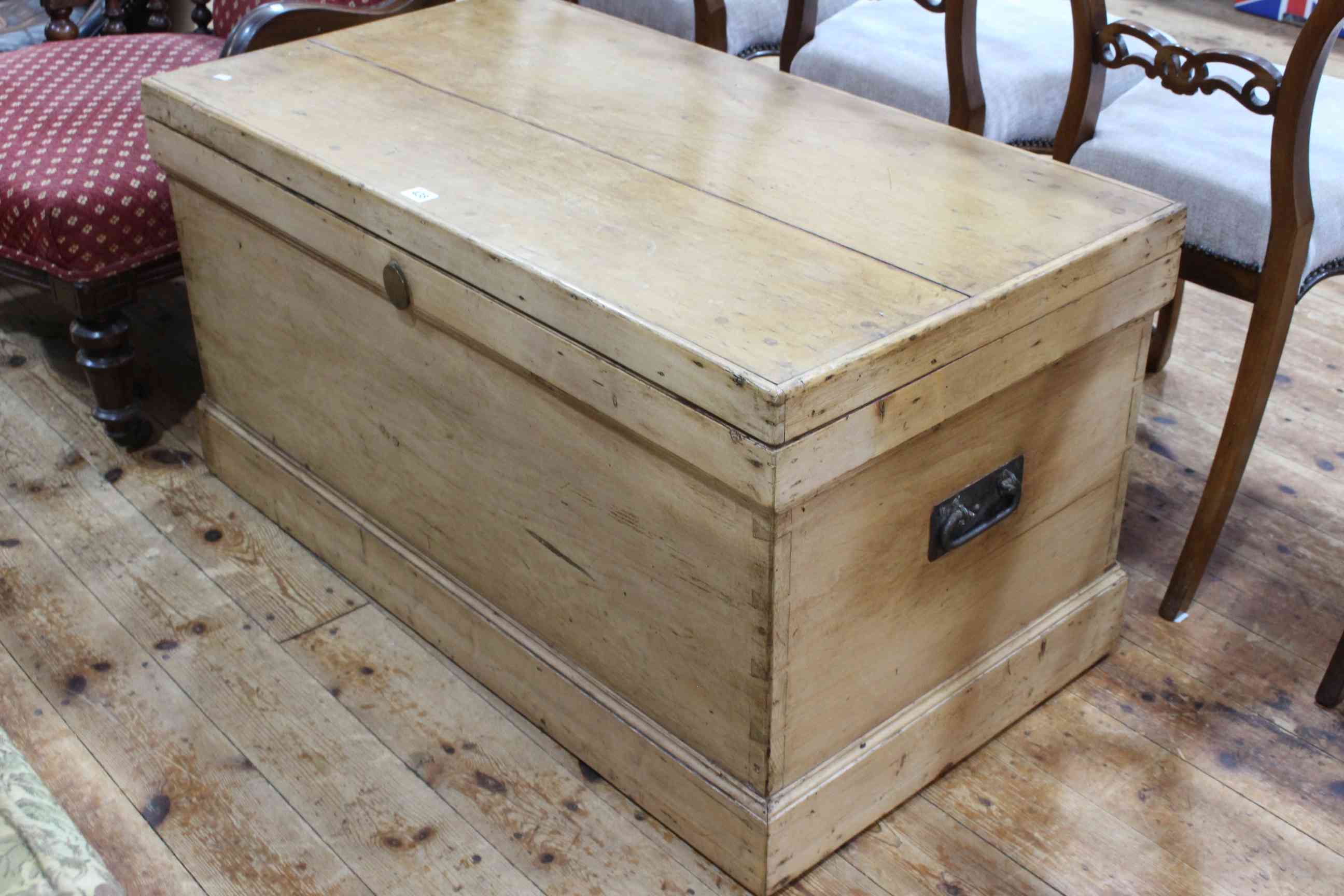 Waxed pine trunk with internal candle box and two drawers, 51 x 98 x 52.5cm.