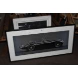 Contemporary print of a classic sports car and framed floral print.