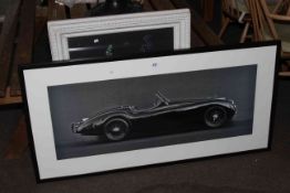 Contemporary print of a classic sports car and framed floral print.