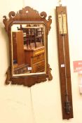 Regency style fretwork wall mirror and oak mounted stick barometer (2).