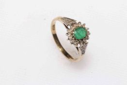 Emerald and diamond 9ct yellow gold ring, size K.