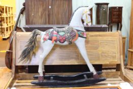 Gaily painted rocking horse, 127cm.