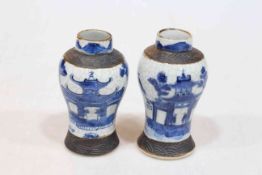 Pair of Chinese blue and white crackle glazed vases decorated with pagoda, bridge and figures, 13cm.