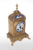 Gilt metal and enamel mantel clock.