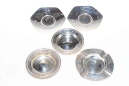 Collection of five silver dishes and ashtrays.