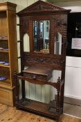 Victorian carved oak mirror back hallstand, 207cm by 103cm by 29cm.