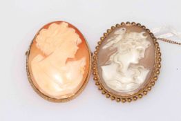 Two 9ct gold cameos.