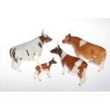 Ayrshire Beswick bull, cow and calf figures together with Guernsey bull (4).