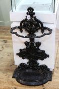 Victorian cast iron stick stand decorated with two relaxing cherubs, 85 x 47cm.