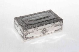 Continental embossed silver box with hinged lid.