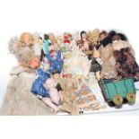 Tray of antique and vintage bisque and other dolls.