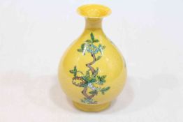 Chinese yellow glazed vase decorated with fruit on dragon incised background, six character mark,