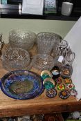 Glass bowls, vases, claret jug, Caithness Summertime bowl and eleven glass paperweights.