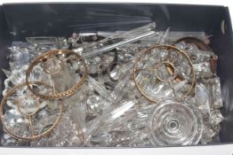 Box of glass lustres including wall light fittings.