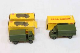 Three Dinky toys Three Ton Army Wagon 621 and two Army Covered Wagons 623.