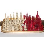 Collection of ivory and bone chess pieces.