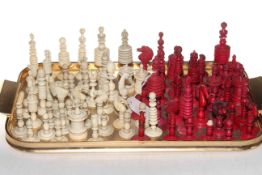 Collection of ivory and bone chess pieces.