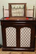 Victorian rosewood chiffonier having brass rail and fabric back and two grille doors, 130 x 93 x 36.