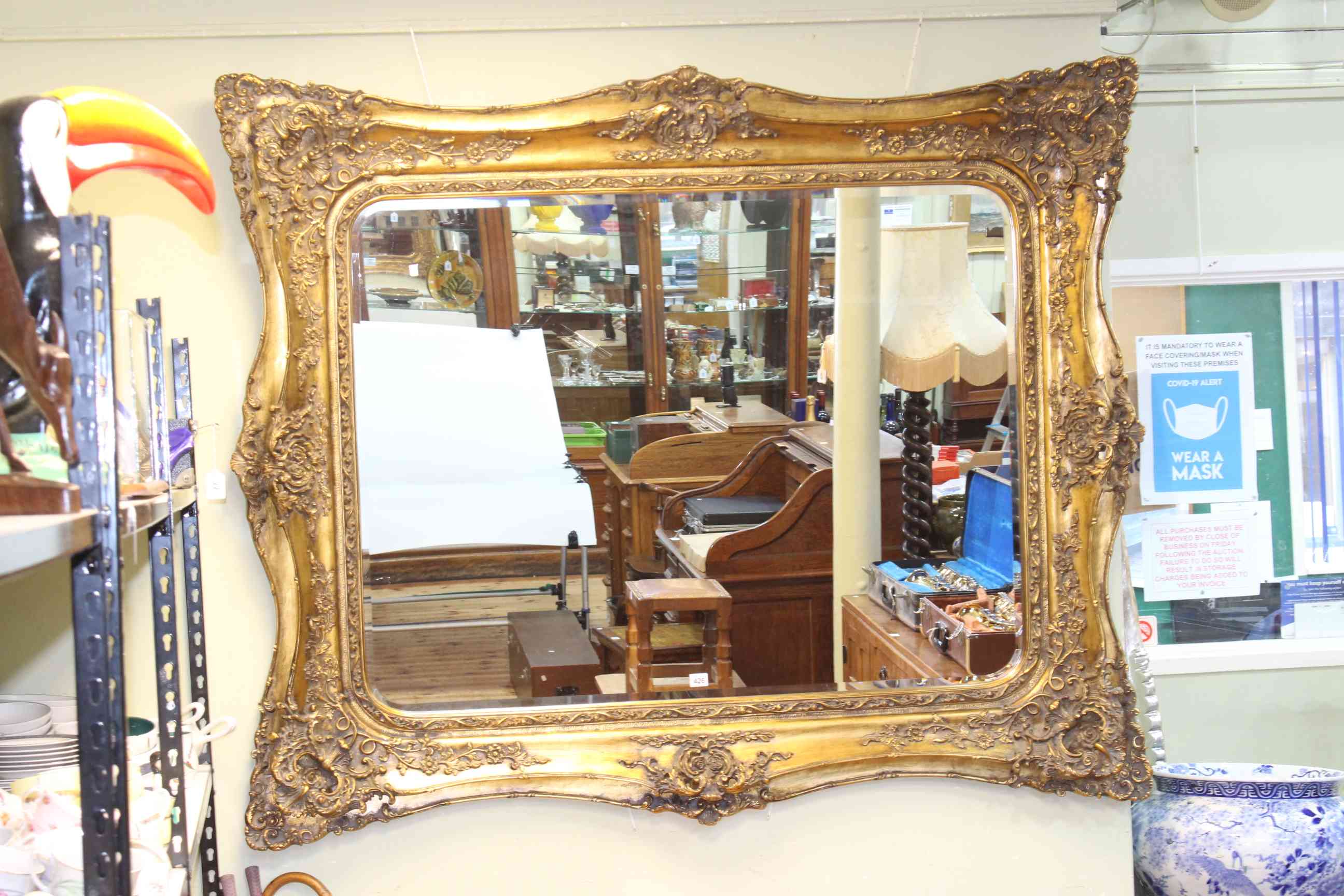 Good large ornate gilt framed bevelled wall mirror, 136 x 164cm.