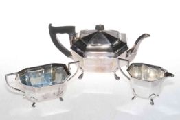 Three piece silver tea set raised on paw feet, Sheffield 1938 by Edward Vogel.