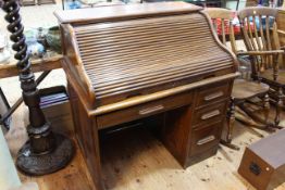 Early 20th Century oak single pedestal roll top desk, 112 x 106 x 76cm.