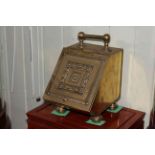 Victorian brass slope front coal box.