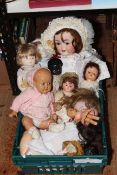 Good assortment of antique and vintage bisque dolls.