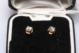 Pair of 18ct yellow gold brilliant cut diamond earrings.