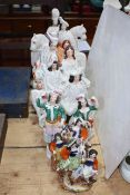 Ten Staffordshire figurines including horses, Scottish kilts, etc.