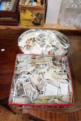 Two tins of cigarette cards including Churchman, Carreras Ltd, Rothmans Ltd, Godfrey Phillips Ltd,